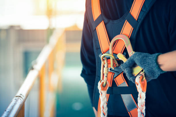 Ensuring fall protection system compliance at commercial construction sites.
